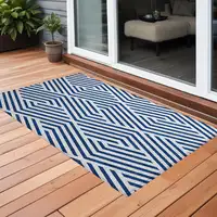 Photo of 3' X 5' Navy and White Geometric Washable Non Skid Indoor Outdoor Area Rug