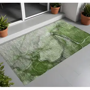 Photo of 3' X 5' Olive Green Abstract Washable Non Skid Indoor Outdoor Area Rug