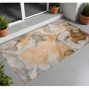 Photo of 3' X 4' Orange Abstract Washable Non Skid Indoor Outdoor Area Rug