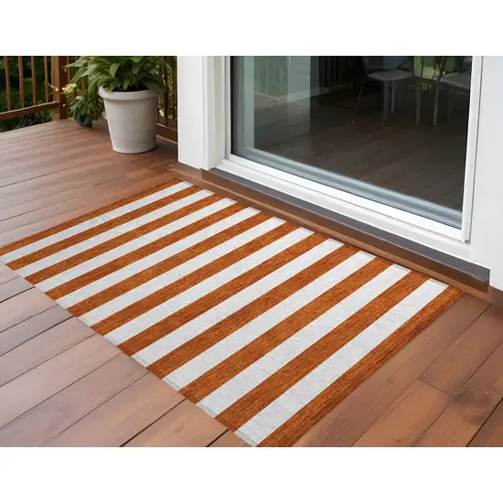 3' X 4' Orange Striped Washable Non Skid Indoor Outdoor Area Rug Photo 1