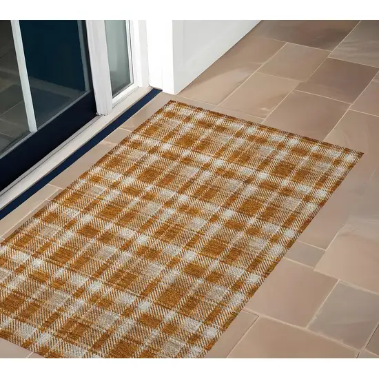 Orange and Ivory Plaid Washable Non Skid Indoor Outdoor Area Rug Photo 1