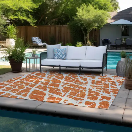 3' X 4' Orange and White Abstract Washable Non Skid Indoor Outdoor Area Rug Photo 8