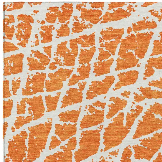 3' X 5' Orange and White Abstract Washable Non Skid Indoor Outdoor Area Rug Photo 7