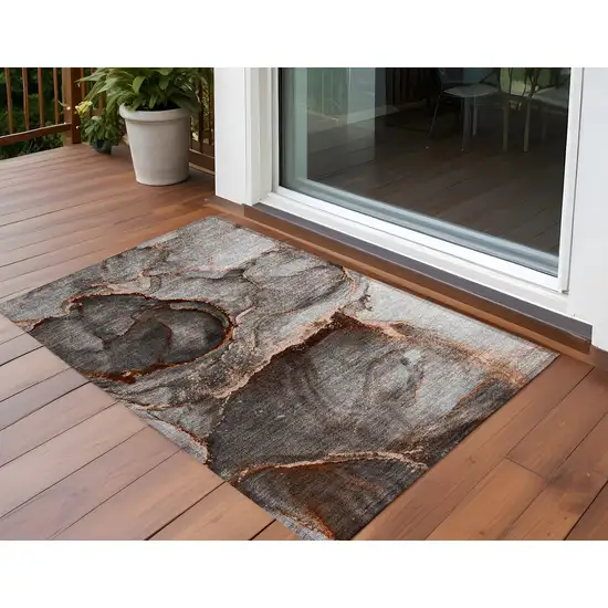 3' X 4' Peach Abstract Washable Non Skid Indoor Outdoor Area Rug Photo 1