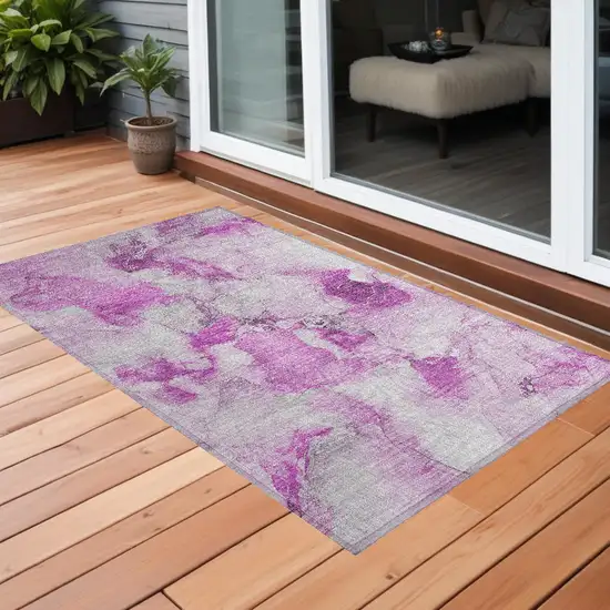 3' X 4' Pink and Ivory Abstract Washable Non Skid Indoor Outdoor Area Rug Photo 1