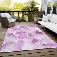 Photo of 3' X 4' Pink and Ivory Abstract Washable Non Skid Indoor Outdoor Area Rug