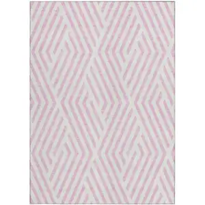 Photo of 3' X 4' Pink and White Geometric Washable Non Skid Indoor Outdoor Area Rug