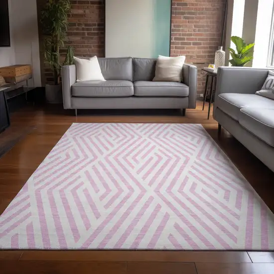 3' X 4' Pink and White Geometric Washable Non Skid Indoor Outdoor Area Rug Photo 9