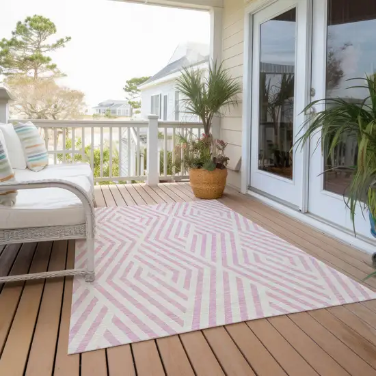 3' X 5' Pink and White Geometric Washable Non Skid Indoor Outdoor Area Rug Photo 8