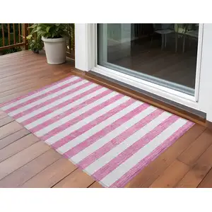 Photo of 3' X 4' Pink and White Striped Washable Non Skid Indoor Outdoor Area Rug