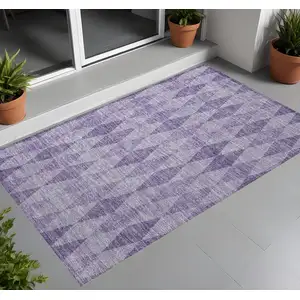 Photo of 3' X 5' Purple Geometric Washable Non Skid Indoor Outdoor Area Rug