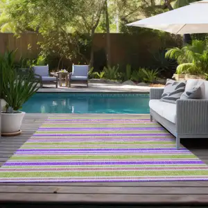 Photo of 3' X 5' Purple Striped Washable Non Skid Indoor Outdoor Area Rug