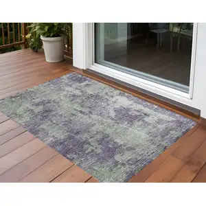 Photo of 3' X 4' Purple and Green Abstract Washable Non Skid Indoor Outdoor Area Rug