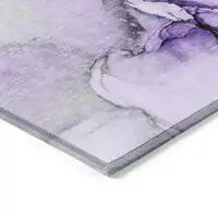 Photo of 3' X 4' Purple and Ivory Abstract Washable Non Skid Indoor Outdoor Area Rug