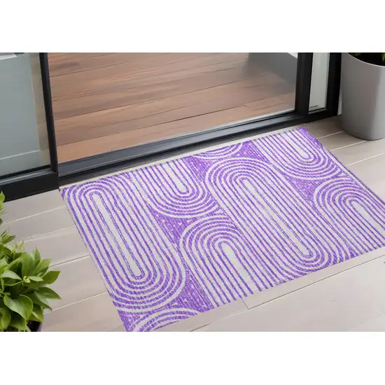 3' X 4' Purple and White Abstract Washable Non Skid Indoor Outdoor Area Rug Photo 1