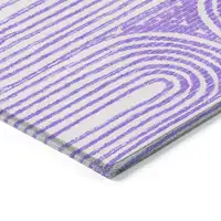 Photo of 3' X 5' Purple and White Abstract Washable Non Skid Indoor Outdoor Area Rug