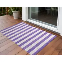 Photo of 3' X 5' Purple and White Striped Washable Non Skid Indoor Outdoor Area Rug