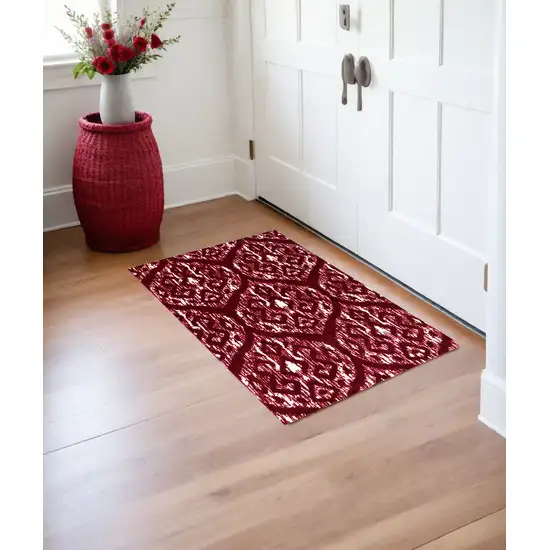 Red and White Ikat Printed Washable Non Skid Area Rug Photo 1