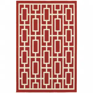 Photo of 6' X 9' Red Geometric Stain Resistant Indoor Outdoor Area Rug