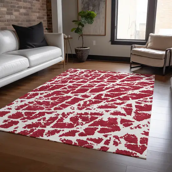 3' X 4' Red and White Abstract Washable Non Skid Indoor Outdoor Area Rug Photo 9