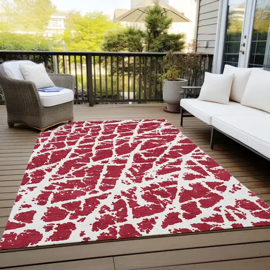 3' X 4' Red and White Abstract Washable Non Skid Indoor Outdoor Area Rug Photo 8