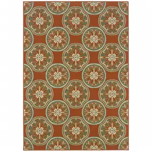 Photo of 3' X 5' Rust Floral Stain Resistant Indoor Outdoor Area Rug