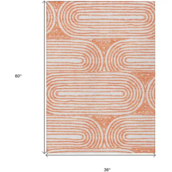 Orange and Ivory Abstract Washable Non Skid Indoor Outdoor Area Rug Photo 3