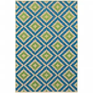 Photo of 4' X 6' Sand Geometric Stain Resistant Indoor Outdoor Area Rug