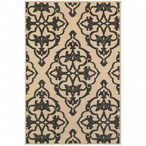 Photo of 2' X 4' Sand Oriental Stain Resistant Indoor Outdoor Area Rug