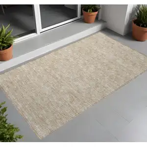 Photo of 3' X 4' Tan Geometric Washable Non Skid Indoor Outdoor Area Rug