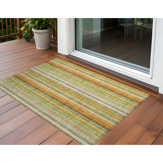 3' X 4' Tan Orange and Green Striped Washable Non Skid Indoor Outdoor Area Rug Photo 1