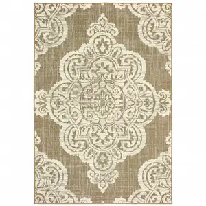 Photo of 9' X 13' Tan Oriental Stain Resistant Indoor Outdoor Area Rug