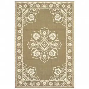 Photo of 9' X 13' Tan Oriental Stain Resistant Indoor Outdoor Area Rug