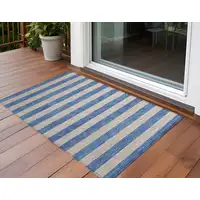 Photo of 3' X 4' Tan Striped Washable Non Skid Indoor Outdoor Area Rug