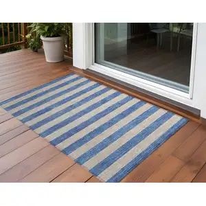 Photo of 3' X 5' Tan Striped Washable Non Skid Indoor Outdoor Area Rug