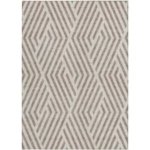 Photo of 3' X 5' Taupe and Ivory Geometric Washable Non Skid Indoor Outdoor Area Rug