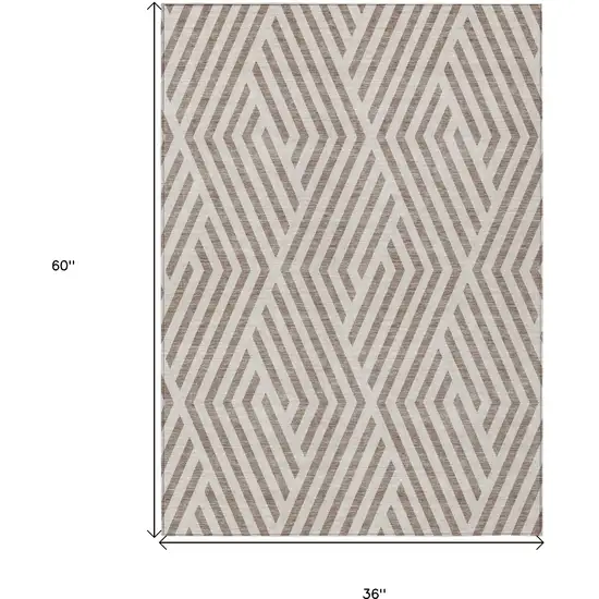 3' X 5' Taupe and Ivory Geometric Washable Non Skid Indoor Outdoor Area Rug Photo 3