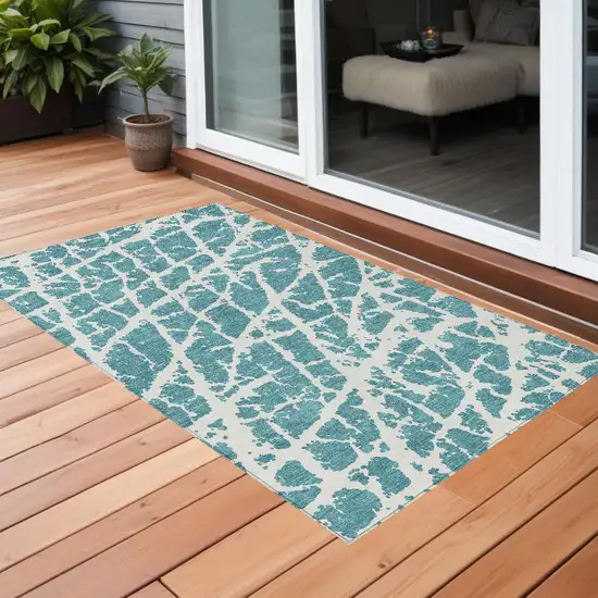 3' X 4' Teal Abstract Washable Non Skid Indoor Outdoor Area Rug Photo 1