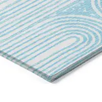 Photo of 3' X 4' Teal Abstract Washable Non Skid Indoor Outdoor Area Rug