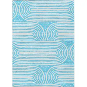 Photo of 3' X 5' Teal Abstract Washable Non Skid Indoor Outdoor Area Rug