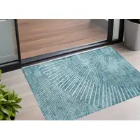 Photo of 3' X 5' Teal Abstract Washable Non Skid Indoor Outdoor Area Rug