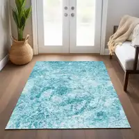 Photo of 3' X 4' Teal Abstract Washable Non Skid Indoor Outdoor Area Rug