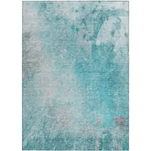 Photo of 3' X 5' Teal Abstract Washable Non Skid Indoor Outdoor Area Rug