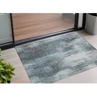 Photo of 3' X 5' Teal Abstract Washable Non Skid Indoor Outdoor Area Rug