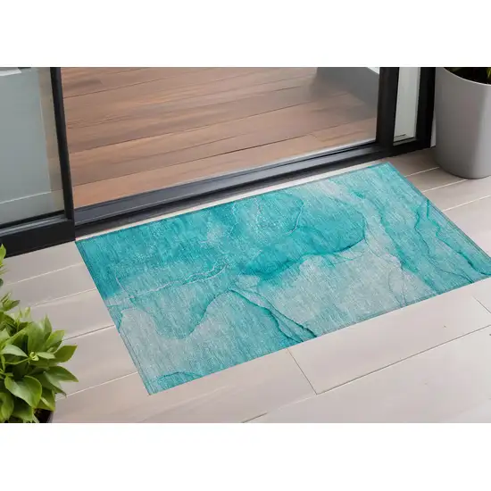 3' X 4' Teal Abstract Washable Non Skid Indoor Outdoor Area Rug Photo 1