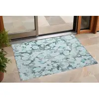 Photo of 3' X 5' Teal Floral Washable Non Skid Indoor Outdoor Area Rug