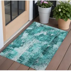 Photo of 3' X 4' Teal Floral Washable Non Skid Indoor Outdoor Area Rug