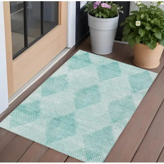 3' X 4' Teal Geometric Washable Non Skid Indoor Outdoor Area Rug Photo 1