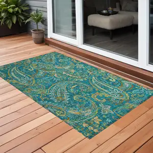 Photo of 3' X 4' Teal Paisley Washable Non Skid Indoor Outdoor Area Rug