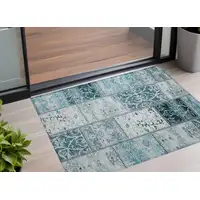 Photo of 3' X 4' Teal Patchwork Washable Non Skid Indoor Outdoor Area Rug